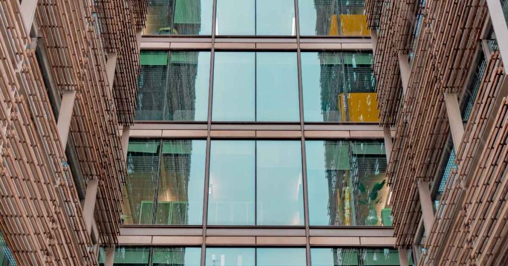 A large building with glass bridging between