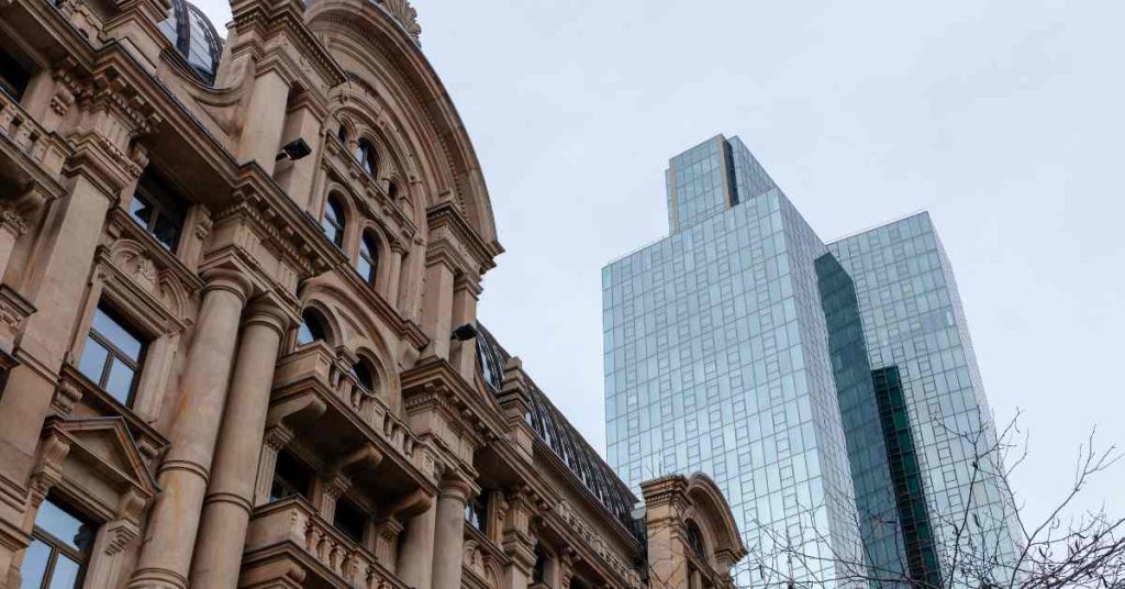 older London building in front of a modern building